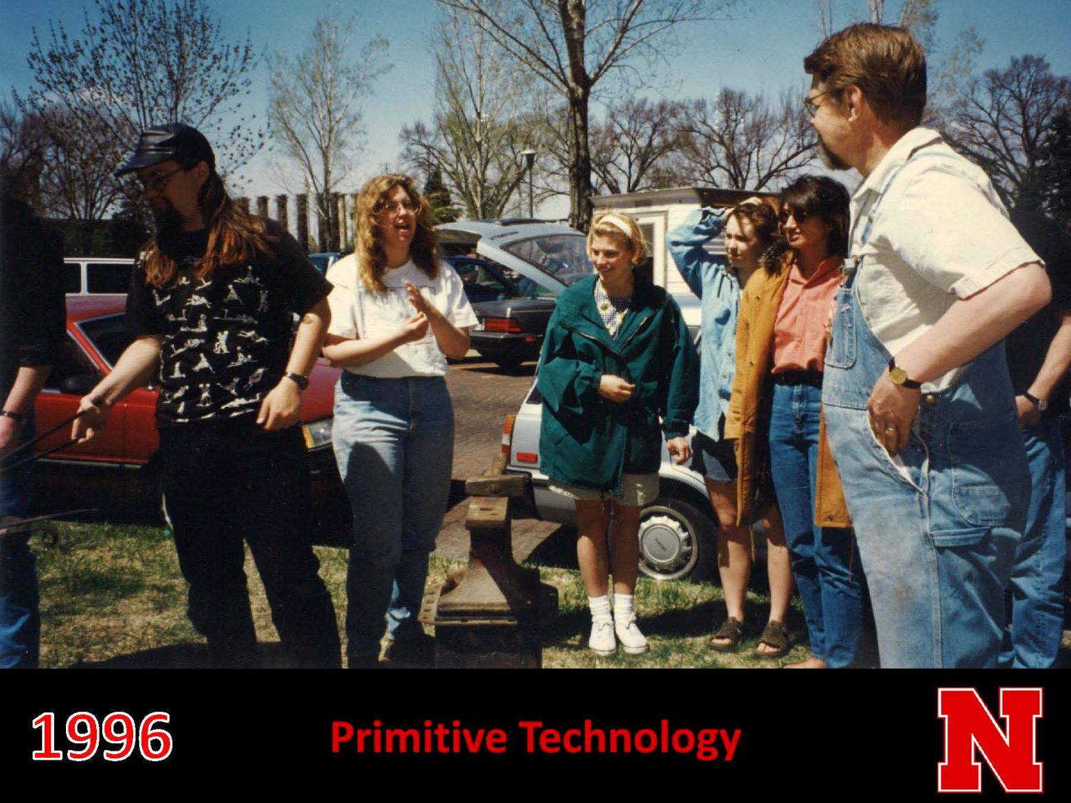 students discussing primitive technology in 1996