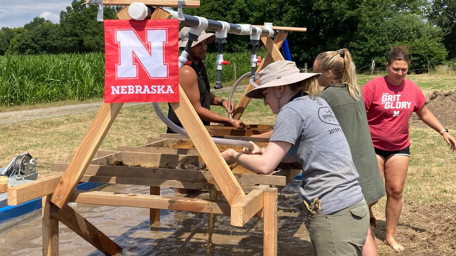 Students working on excavation project