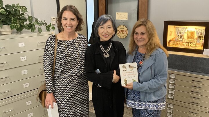 Amy Tan, center, with Sophia Perdikaris, right